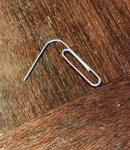 Use Medium sized Paper clip to open SIM Card Slot On iPhone.